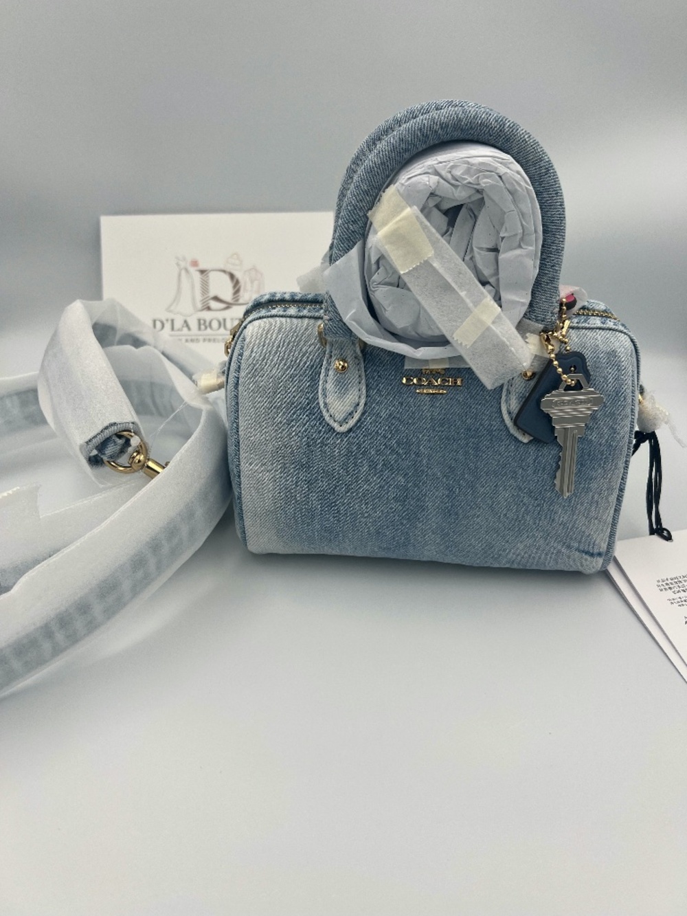 Coach Mini Rowan Crossbody Bag In Loved Denim With Charms
